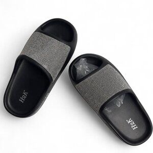 Size US 7 Black rhinestone slides with a touch of glamour